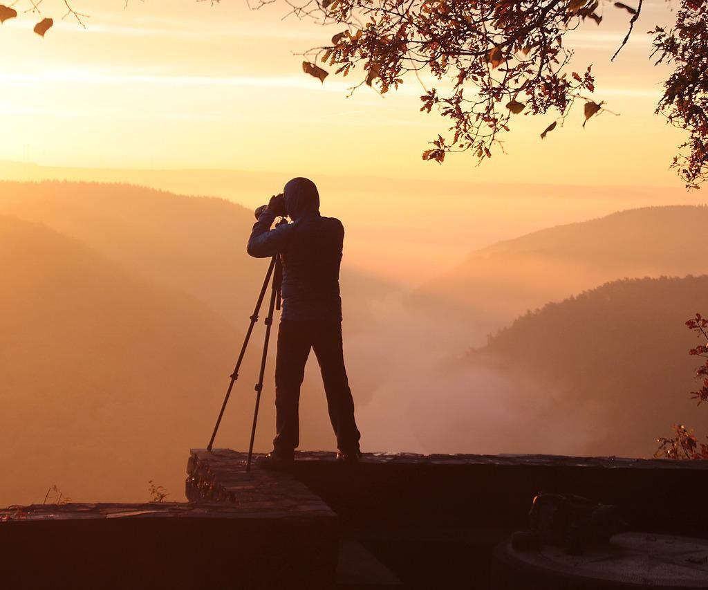 Photographer in sunset